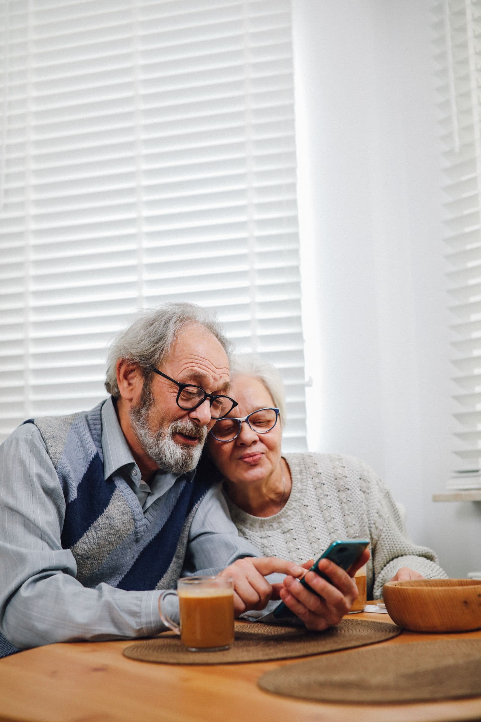 An older couple staying connected with family from home